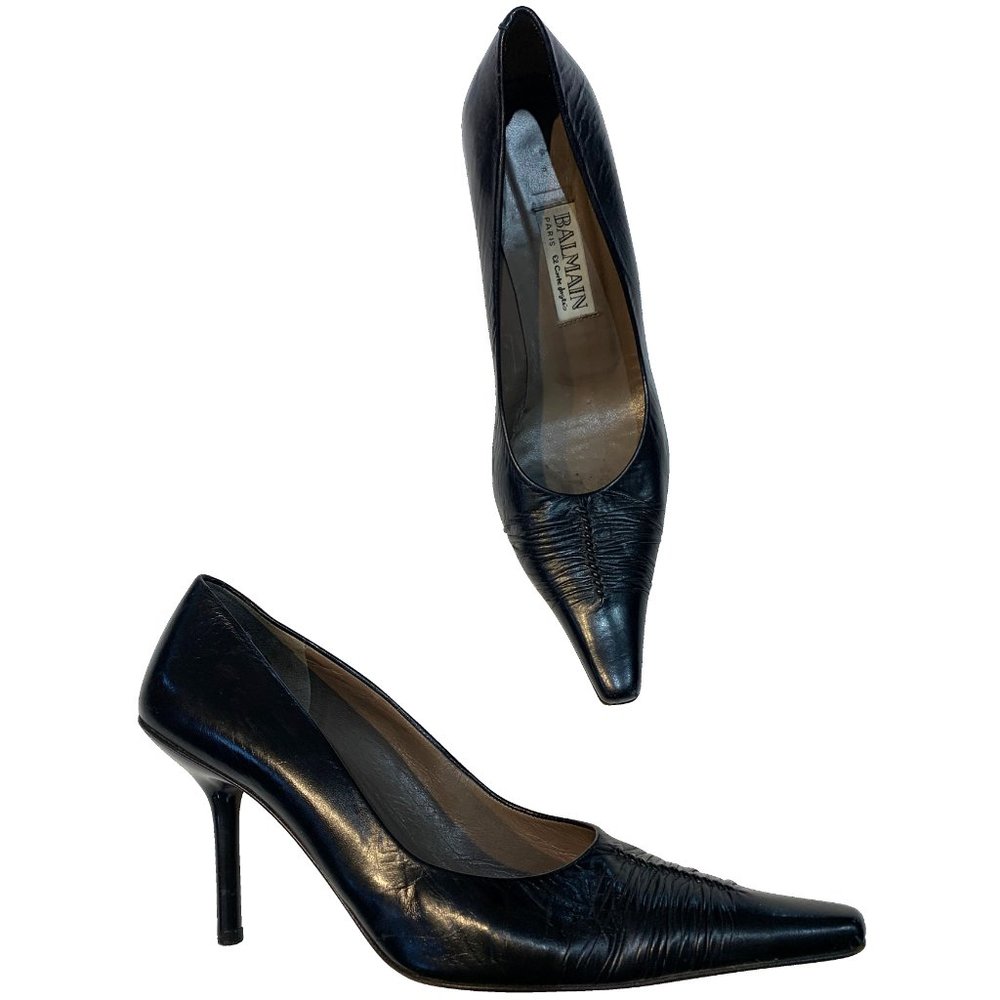 Black leather pointy pumps